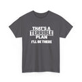 A man wearing a gray graphic t-shirt with the white printed text 'THAT'S A TERRIBLE PLAN I'LL BE THERE', standing in front of a storefront.