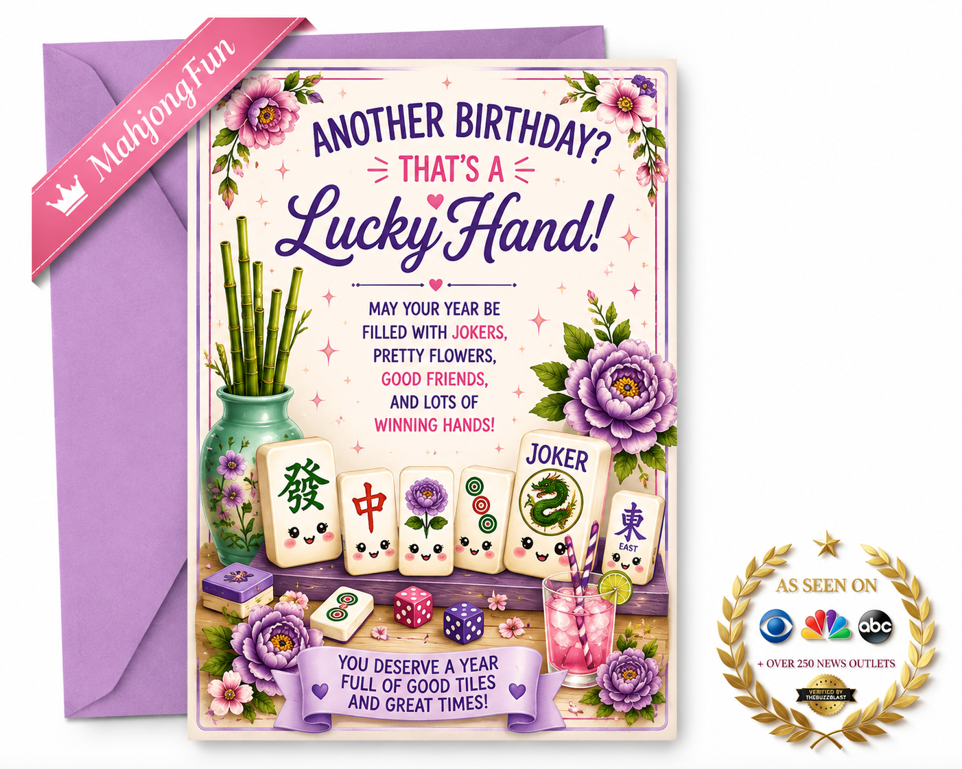 A birthday card and matching purple envelope shown on a white background. The card reads 'ANOTHER BIRTHDAY? THAT'S A Lucky Hand!' with floral and mahjong-inspired artwork, including playing cards, flowers, and a pink ribbon banner.