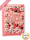 A pink 3D papercraft birthday card featuring mahjong tiles and pink roses, with a pink envelope behind it. A pink ribbon in the top left corner reads 'MahjongFun', and a gold 'As Seen on NBC' logo is in the bottom right corner.
