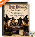 A Halloween-themed Mahjong card game package shown on a white background, featuring illustrated witches playing mahjong with the text 'Happy Halloween Eat, Drink & Be Scary.