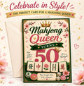 A birthday card for a 50th birthday 'Mahjong Queen' with a white envelope behind it, set against a light cream background decorated with pink flowers and gold confetti. The card features a green border, pink and green typography, a gold crown, and illustrations of mahjong tiles and dice.