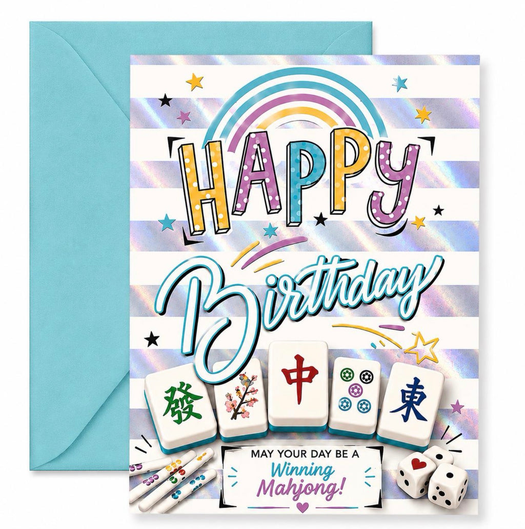A birthday greeting card with a matching light blue envelope. The card features a white and iridescent holographic striped background with a rainbow, colorful 'HAPPY Birthday' text, mahjong tile graphics, and dice.