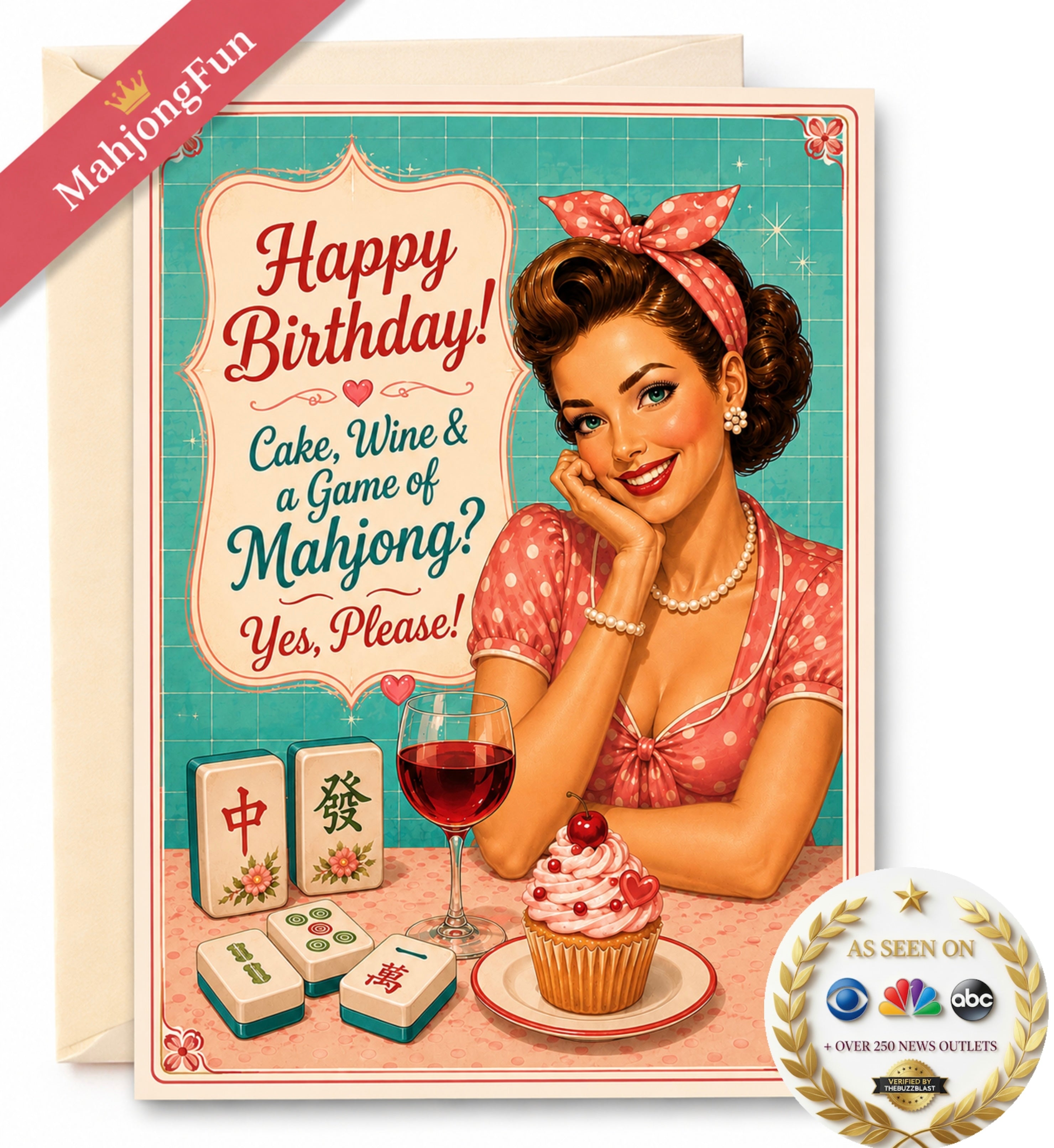 A birthday greeting card featuring a retro 1950s-style illustration of a woman with a pink polka-dot headband and pink dress, seated at a table with mahjong tiles, a glass of red wine, and a cupcake. The card reads, 'Happy Birthday! Cake, Wine & a Game of Mahjong? Yes, Please!' A kraft envelope is partially visible behind the card, with a pink 'MahjongFun' ribbon and a circular 'As Seen On' badge in the corners.