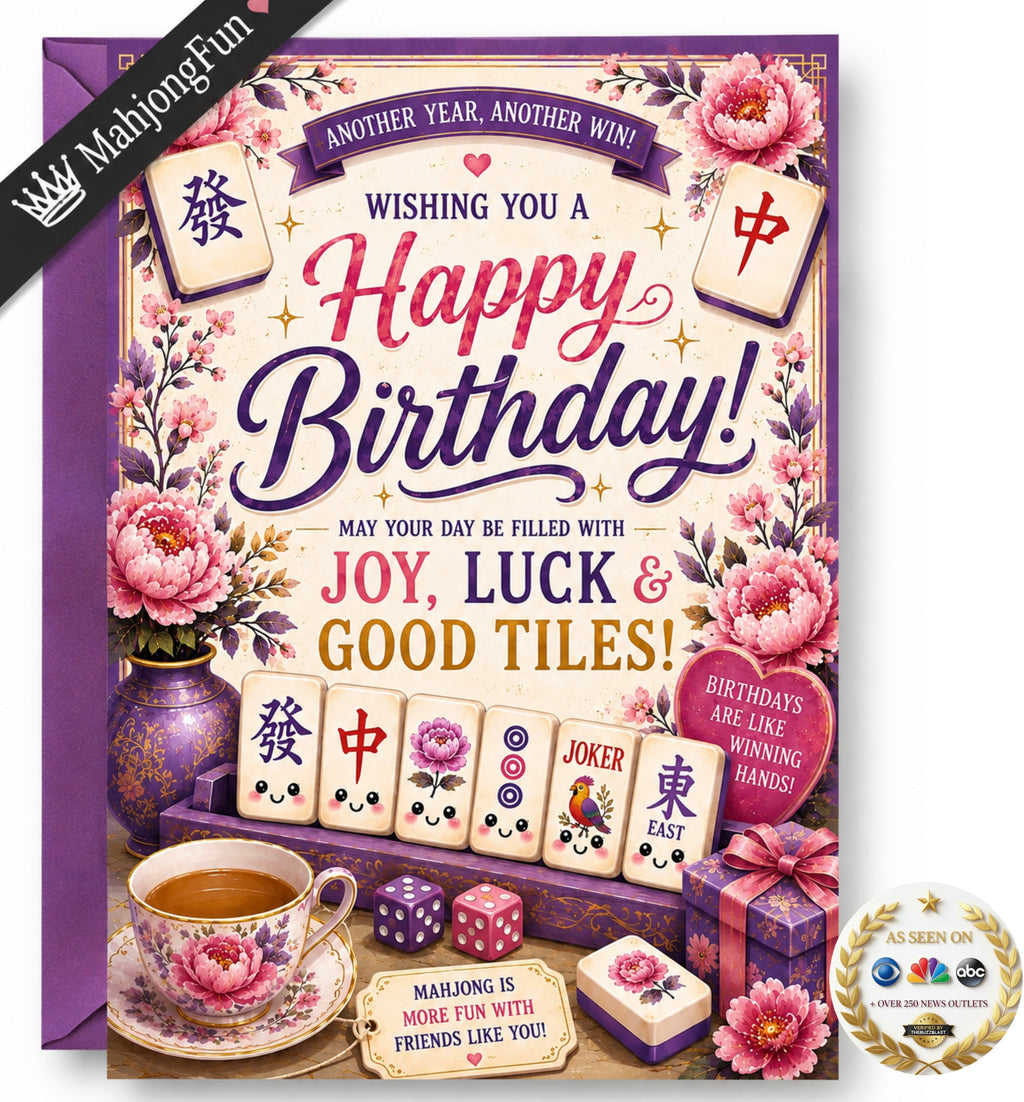 A square birthday card design with a Chinese mahjong theme, featuring floral artwork, playing card tiles, a teacup with pink flowers, gift boxes, and celebratory text including 'Happy Birthday!' and 'May your day be filled with joy, luck & good tiles!'. A black diagonal banner reads 'MahjongFun' and a circular badge says 'It's seen on TV'.