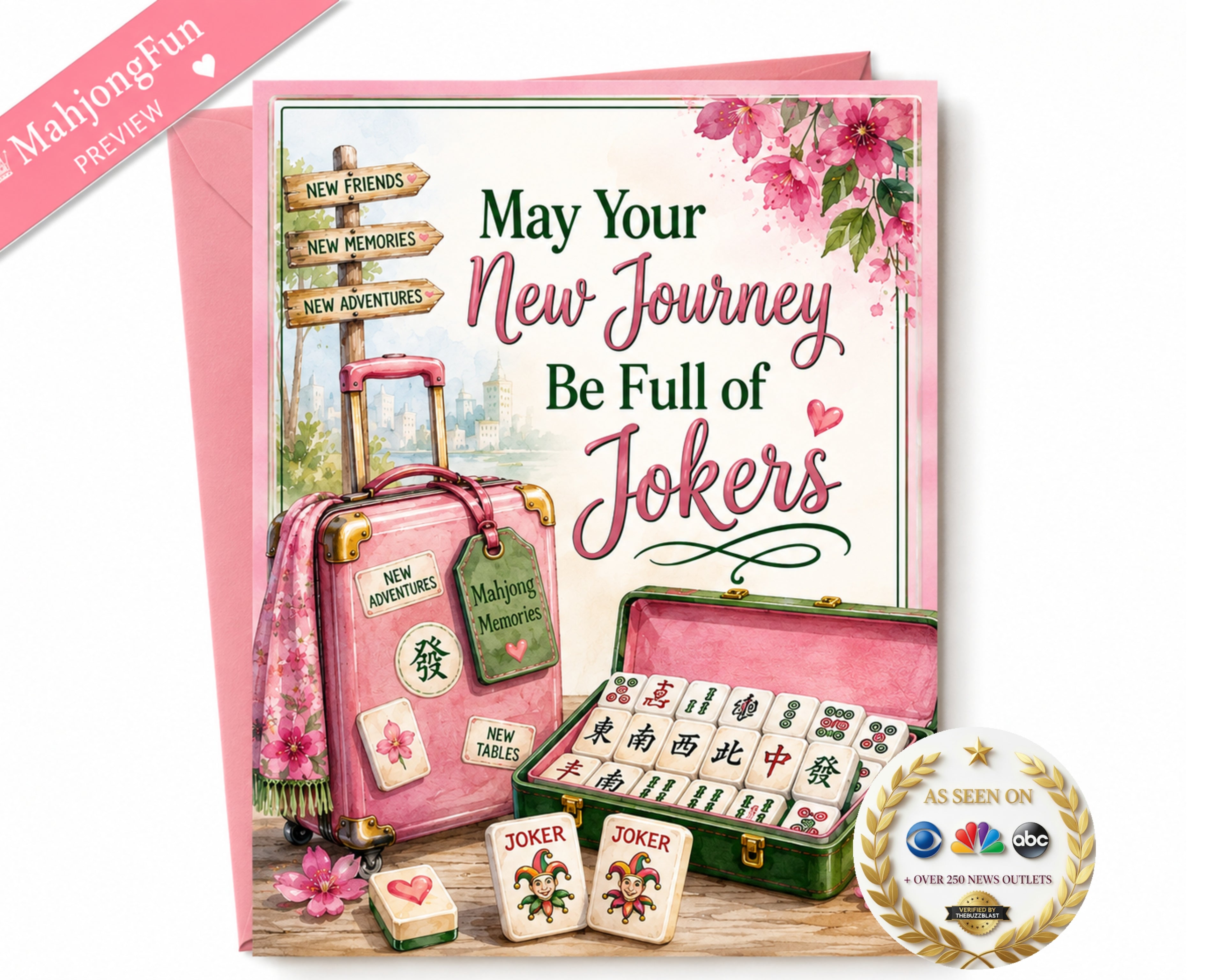 A pink greeting card with a Mahjong-themed design, featuring the text 'May Your New Journey Be Full of Jokers' alongside illustrations of a pink suitcase, an open pink mahjong set, and several joker tiles. A pink envelope is shown behind the card, along with a pink 'MahjongFun PREVIEW' ribbon in the top-left corner and an 'AS SEEN ON' NBC logo badge in the bottom-right corner.
